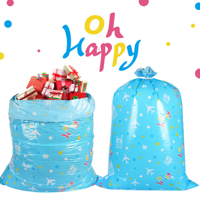 أكياس هدايا عملاقة 56 بوصة LDPE مع خيط وعلامة لأعياد الميلاد